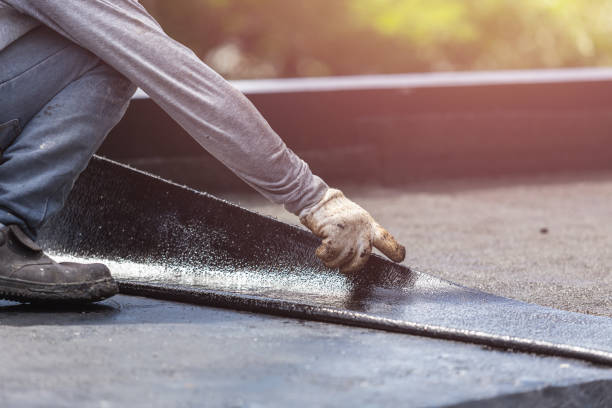 Professional Waterproofing technician working in East Bethany, NY